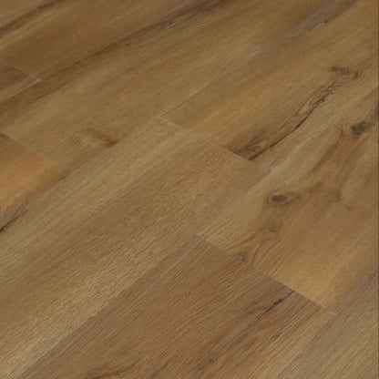Light brown wood flooring planks with a natural oak grain pattern close up cameo. 