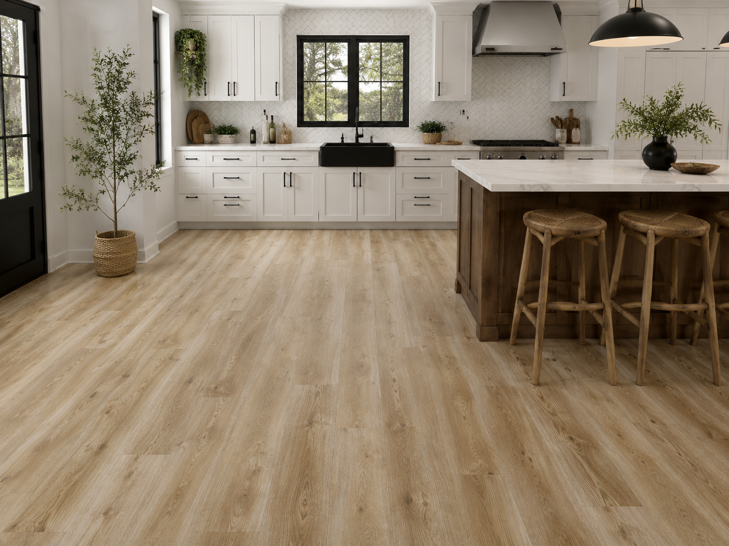 Ashdown Light Oak Luxury Click Vinyl Flooring 6mm installed in a bright contemporary kitchen, featuring wide light oak-effect planks with warm natural tones, authentic wood grain detailing, subtle knot patterns and a realistic embossed matt finish, paired with white shaker cabinets, a farmhouse sink and a large kitchen island.