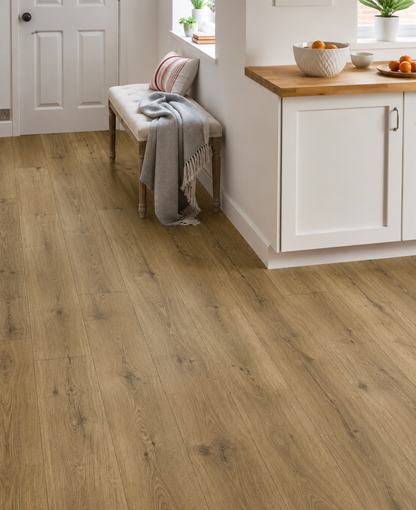 Fellside Oak XL Luxury Click Vinyl Flooring 7mm in a bright modern kitchen, showcasing extra-large natural oak-effect planks with realistic wood grain, authentic knots, textured matt finish and waterproof SPC click flooring.