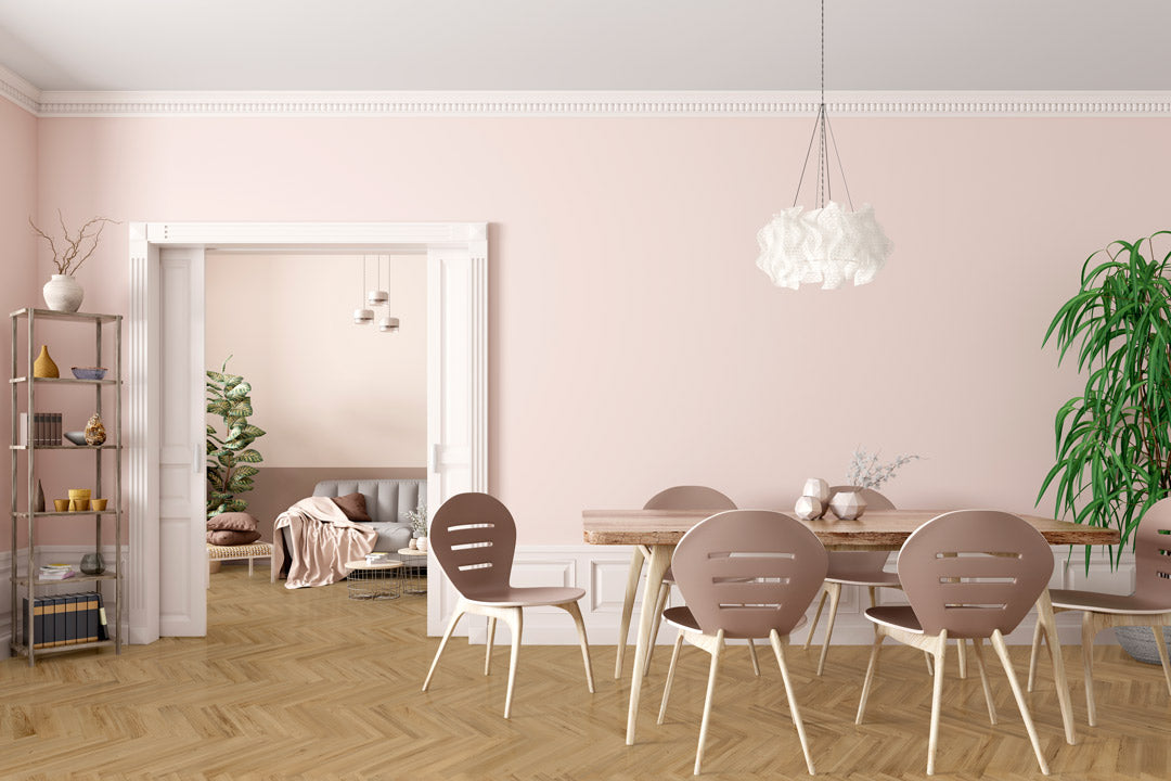 Golden Oak Herringbone Luxury Click Vinyl Flooring 6mm installed throughout a bright open-plan dining room and living space with soft neutral décor, showcasing authentic oak grain, warm golden tones and realistic waterproof click vinyl flooring.